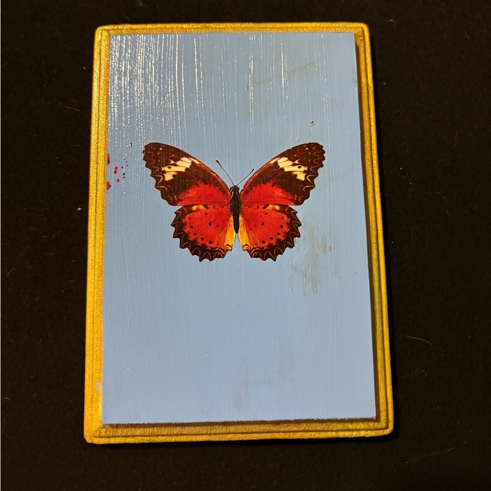 Red Butterfly Wall Art on Blue Canvas